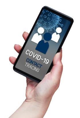 Contact Tracing COVID-19 Corona Virus Tracking App concept, hand holding cell phone with application design on screen isolated on white background Downloaded Contact Tracing COVID-19 Corona Virus Tracking App concept, hand holding cell phone with application design on screen isolated on white background